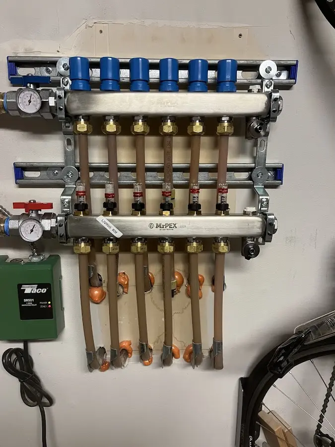 Plumber performing Water Heater Repair at a residential property in Lake Wilderness